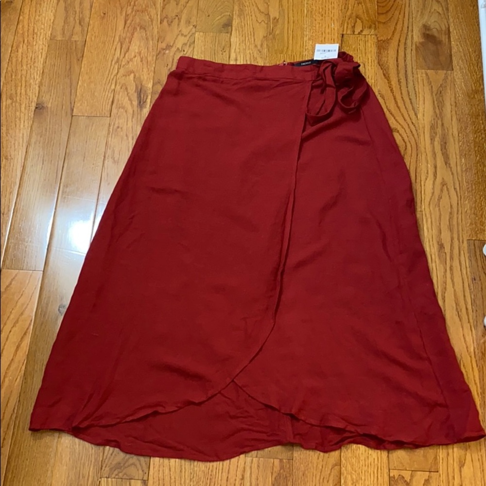 Long burgundy skirt with slit